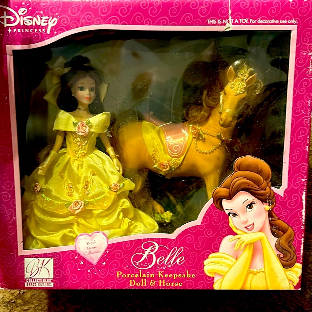 Disney royal horse collection.   Bell porcelain keepsake doll and horse